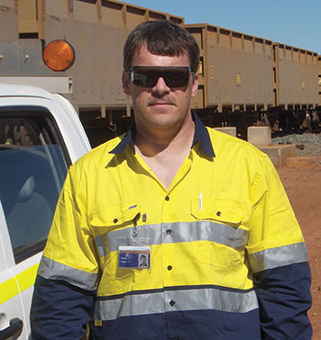 Warren Fargo ’05, a senior field service specialist with New York Air Brake Corporation, at work in Australia.